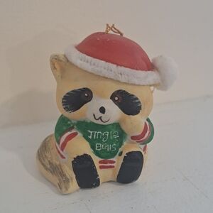Vintage Porcelain Raccoon Santa Bell Ornament.